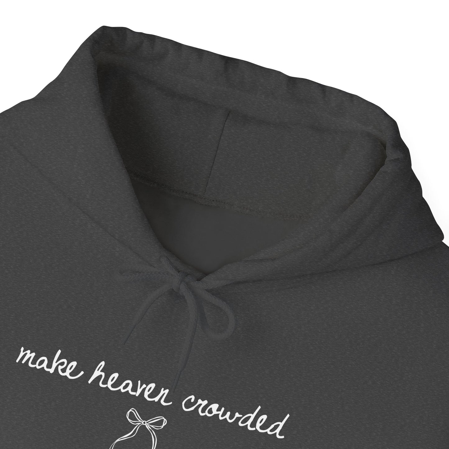 Dark gray hoodie with 'make heaven crowded' text and bow design on a white background