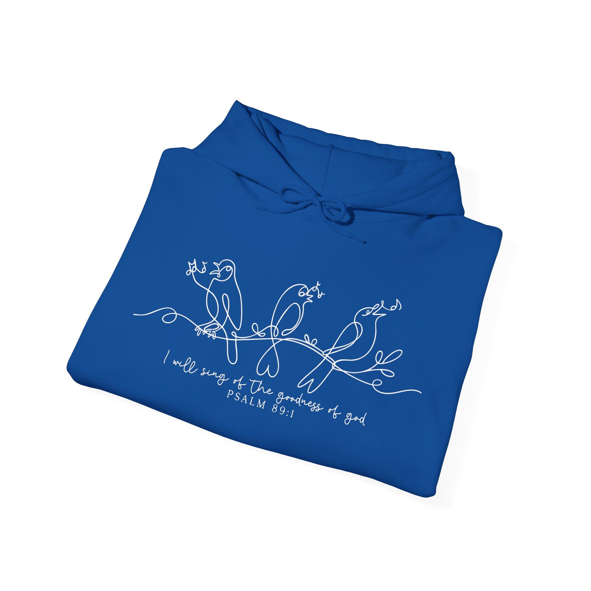 Folded blue hoodie with white bird design and text "I will Sing of the Goodness of God" on a white background