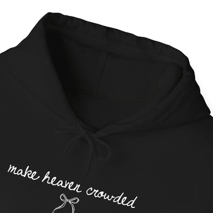 Black hoodie with 'make heaven crowded' text and bow design on a white background