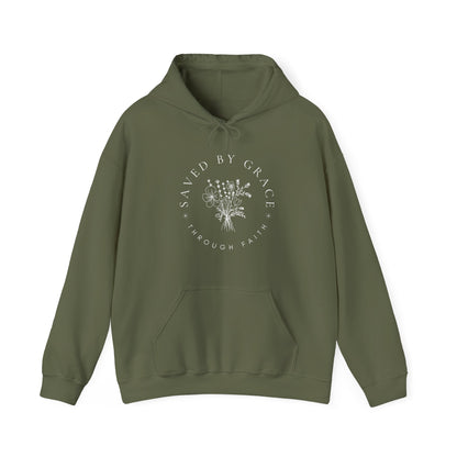 Green hoodie with 'Saved by Grace through Faith' text on a white background