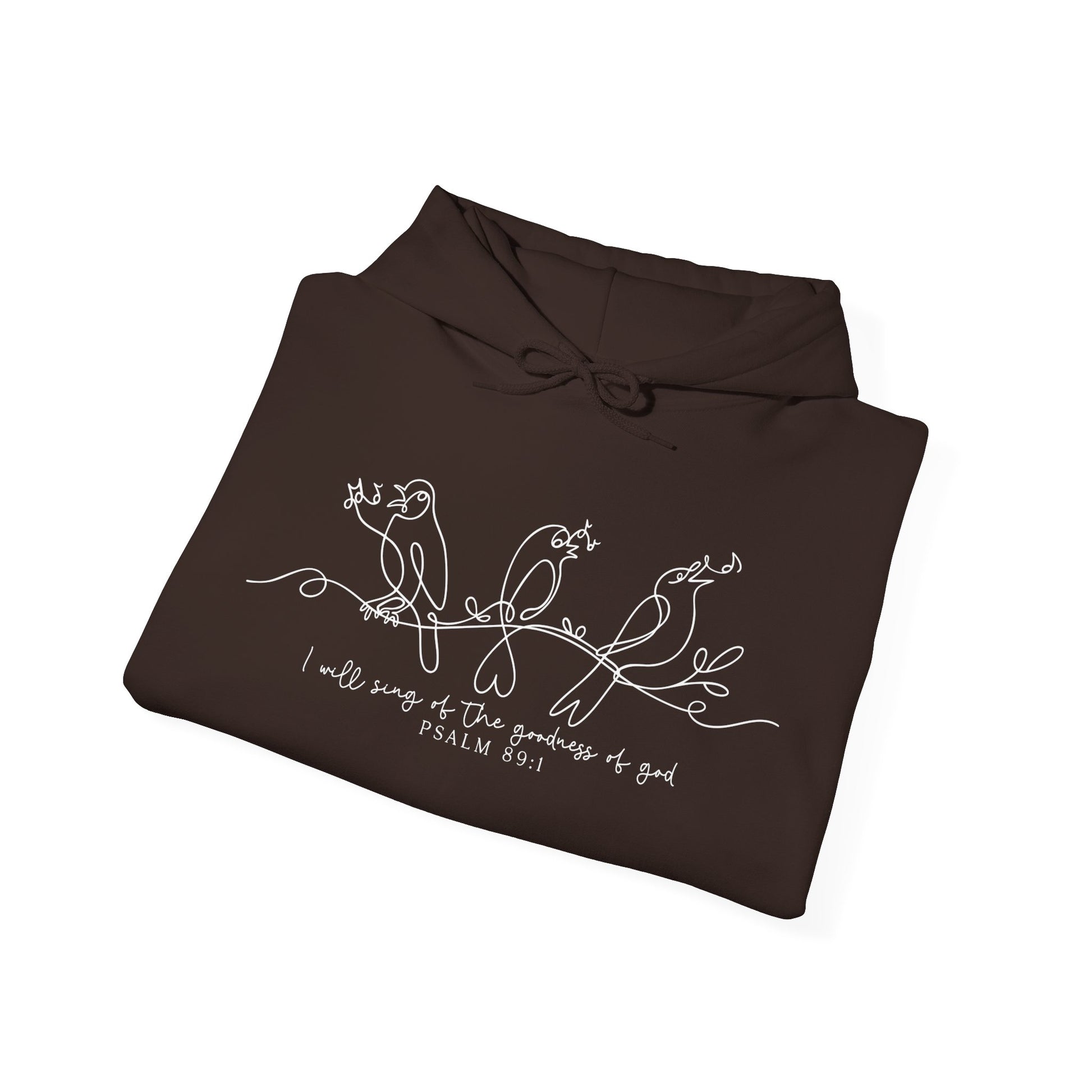 Folded brown hoodie with white bird design and text "I will Sing of the Goodness of God" on a white background