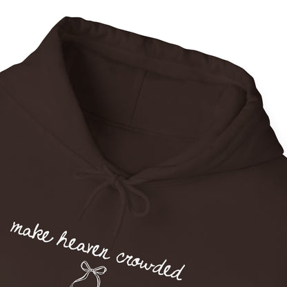 Brown hoodie with 'make heaven crowded' text and bow design on a white background