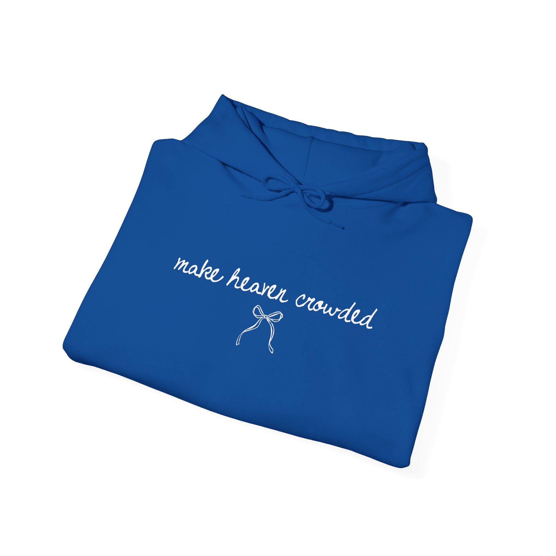 Folded blue hoodie with 'make heaven crowded' text on a white background