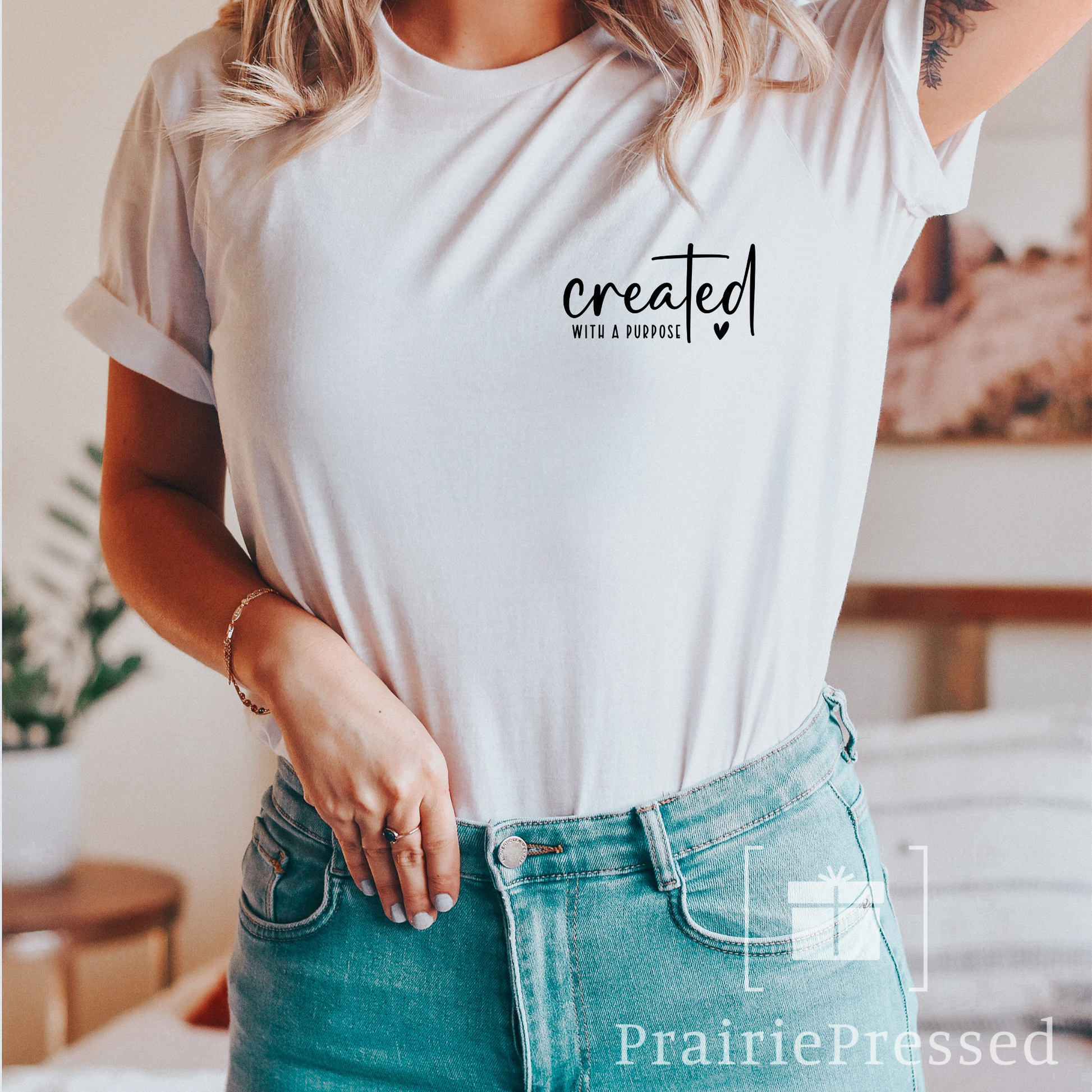 White Soft Bella Tshirt with Created for a Purpose written in small cute font 